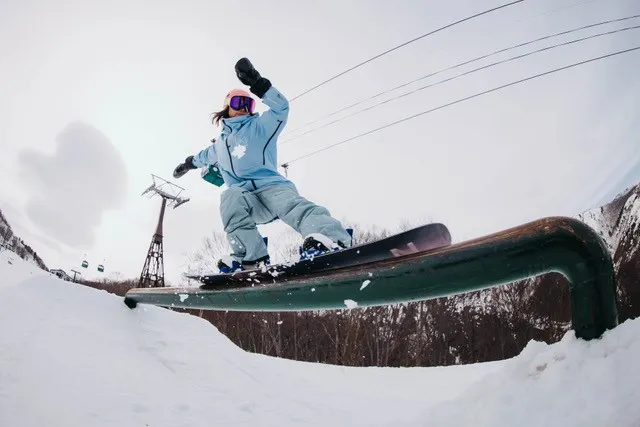 Snowboarder on a rail