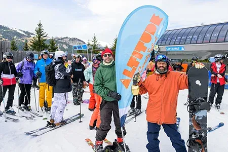 People Holding Altitude Banner