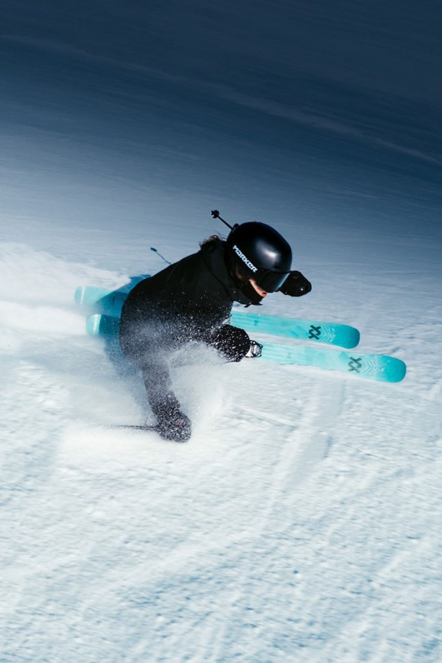 Skier wearing a Marker ski helmet and goggles